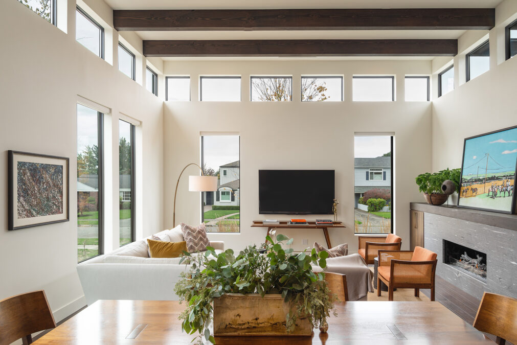 Spacious Living Room With High Ceilings And Natural Light